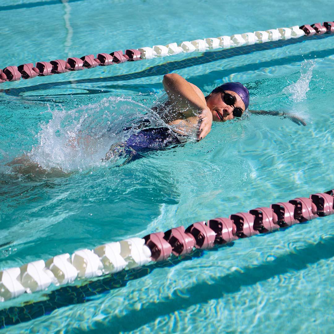 woman swimming in lap pool