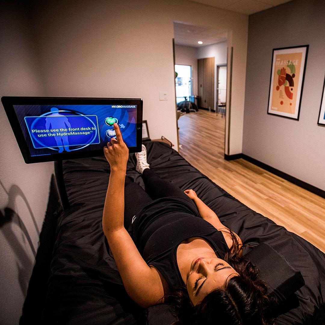 woman relaxing on a HydroMassage bed