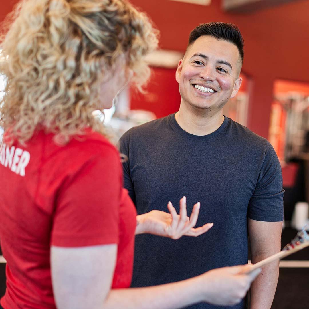 Personal Trainer with Male Client