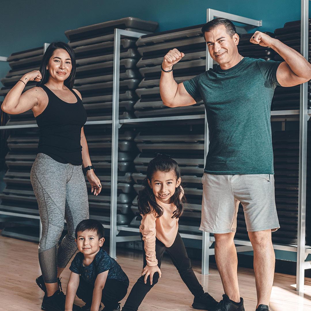 Family in group fitness room