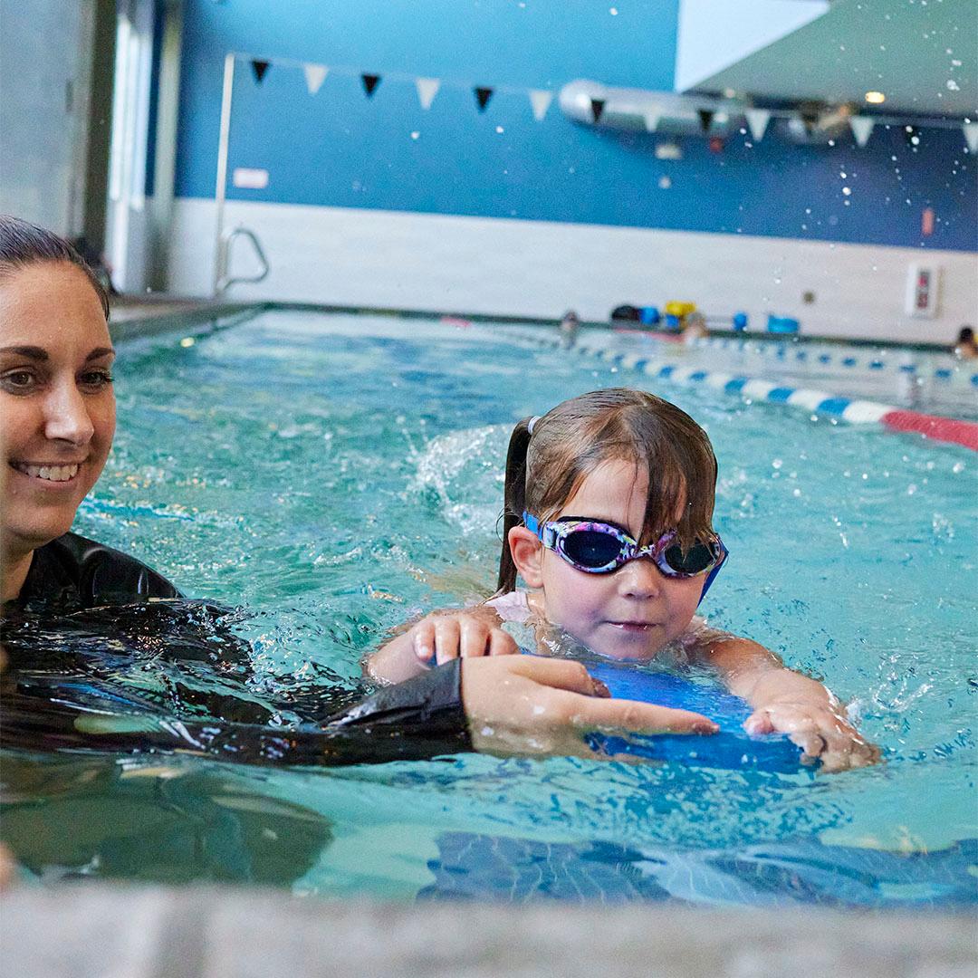 swim instructor and child